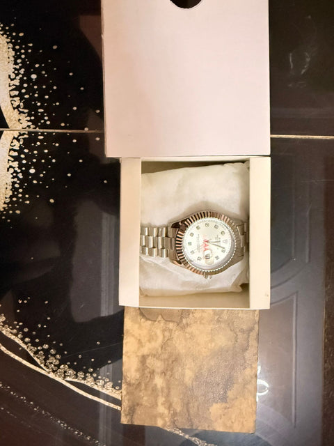 Rolex  Silver chain with white dile green dile blue dile black dile dark blue dile red dile