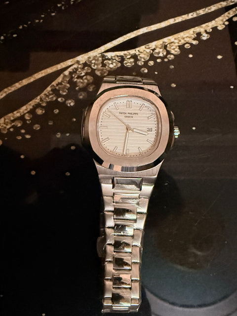 Patek Philips with semi auto matic mein yeh Dile colr  black brown greyish blue tiphin  Or golden or silver chain with semi automatic black and white