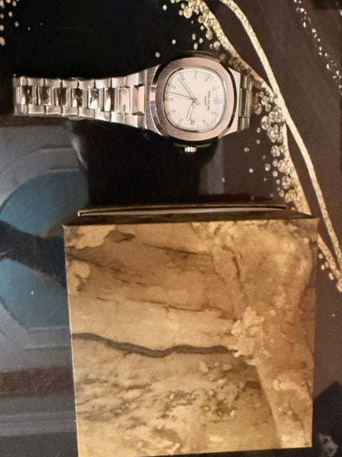 Patek Philips with semi auto matic mein yeh Dile colr  black brown greyish blue tiphin  Or golden or silver chain with semi automatic black and white