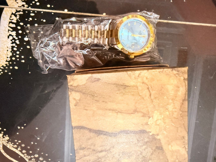Rolex with golden and silver chain dile colr tiphin blue dark blue green greyish blue brown red golden