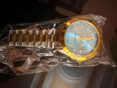 Rolex with golden and silver chain dile colr tiphin blue dark blue green greyish blue brown red golden