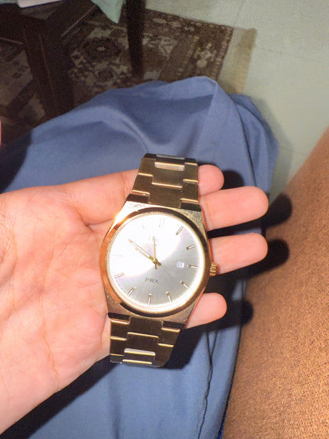 Tissot with full golden chain semi automatic and white dile